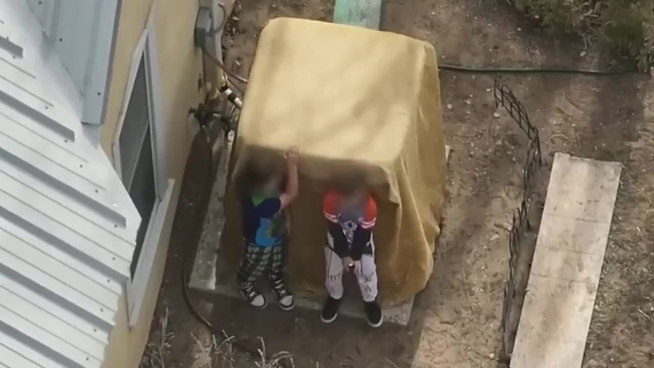 New Mexico police fire non-lethal rounds and disarm two boys who were holding a loaded handgun.