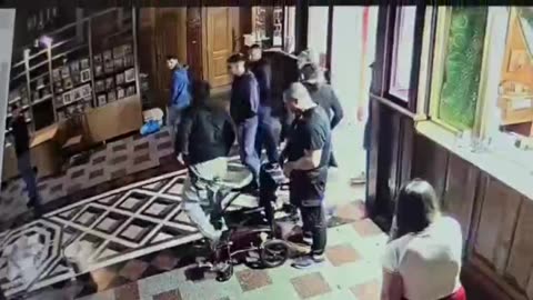 Raider uses wheelchair to enter church and store weapons