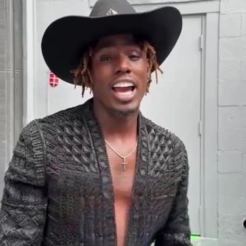 Jamal Roberts proudly sport matching shirts