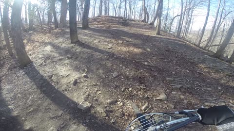 Bike ride, fast to and from trail in the woods