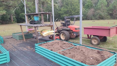 Cleaning out the Chicken pens and adding to the Raised beds