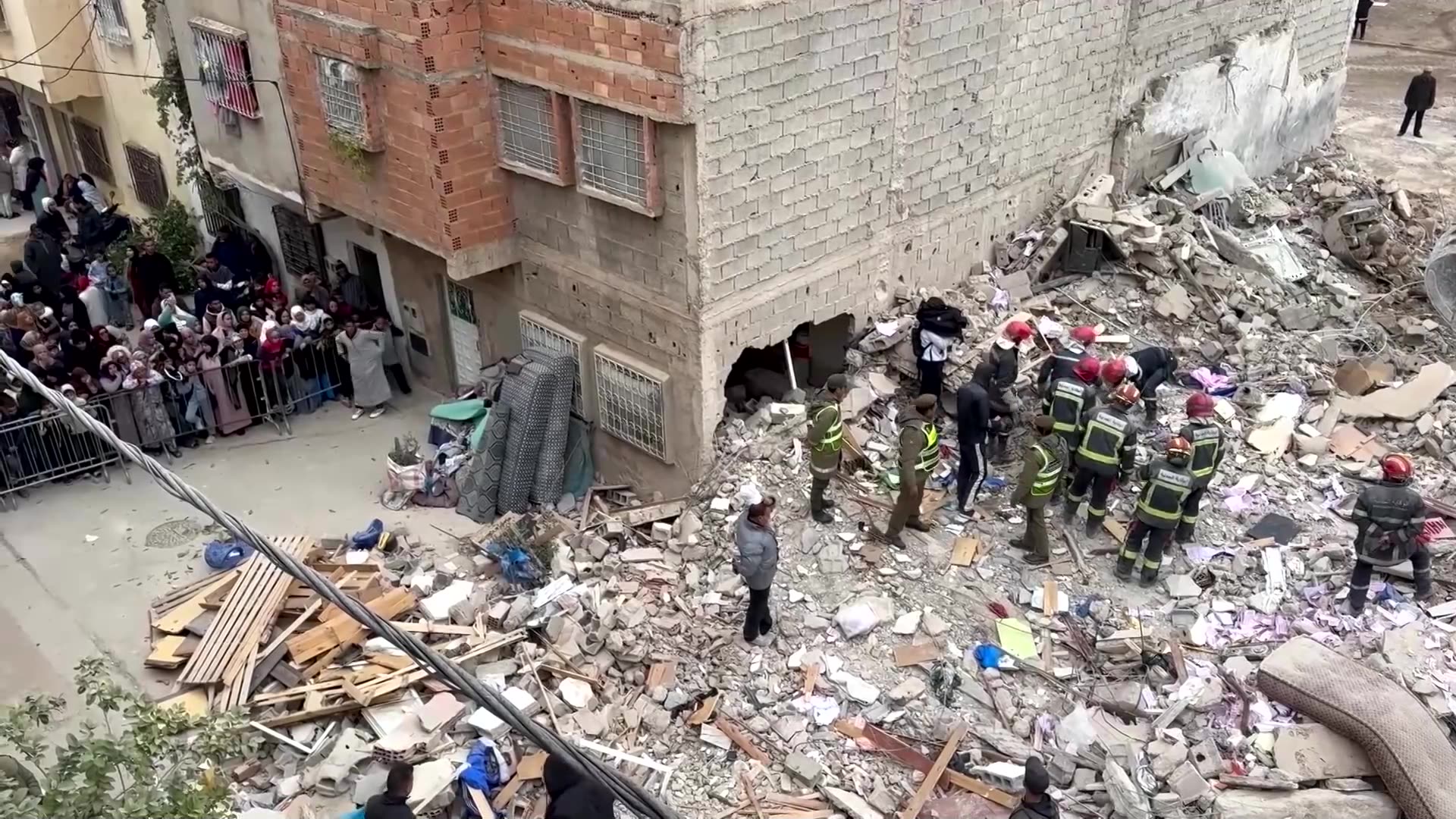 Bulldozers clear rubble from buildings collapse in Morocco