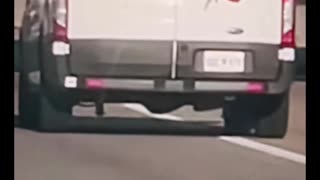 Oklahoma inmate hanging out of transport van