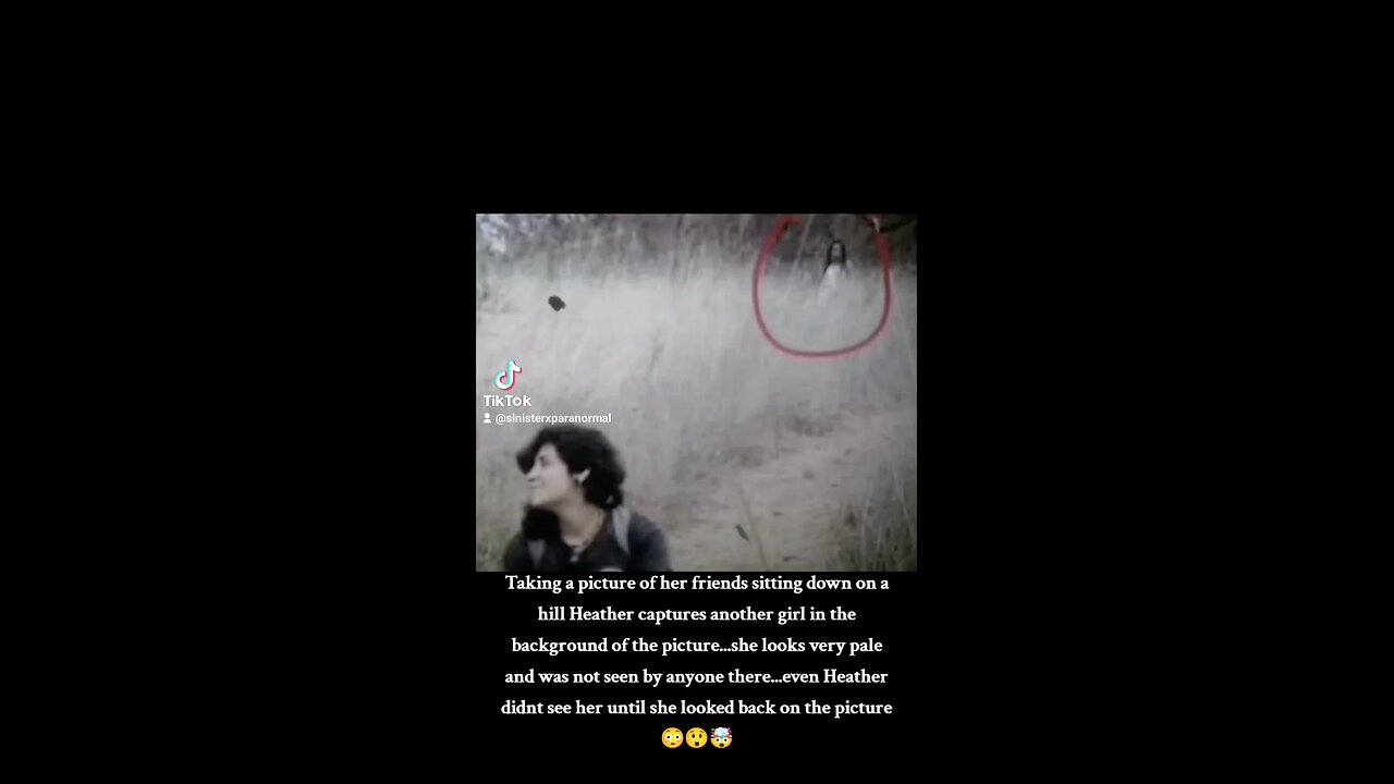 Ghost captured in back of two girls
