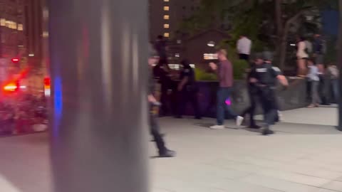 BREAKING: Seattle police RUSH RIOTERS surrounding Downtown Federal building.