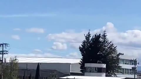 Small plane carrying 10 people crashes into building in Toluca, west of Mexico City.