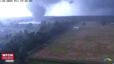 WATCH: WFCN Towercam shows large tornado moving south of Marion, Illinois.