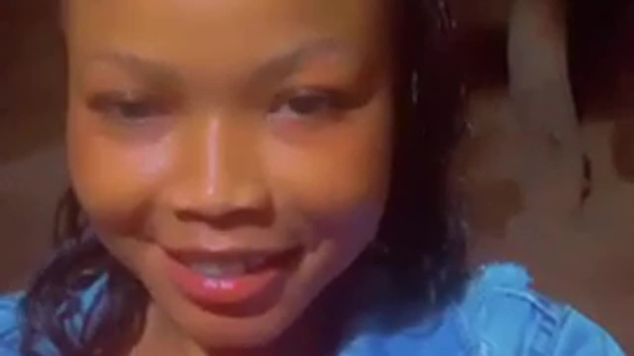 Beautiful Girl Smiles in Camera