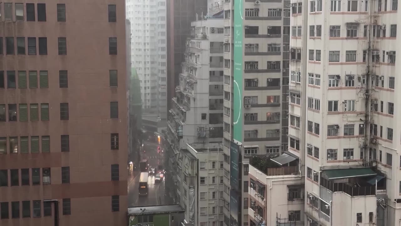 Intense rain creates a waterfall in Hong Kong