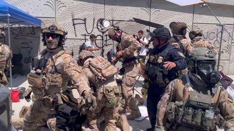 Watch as CBP agents storm into anti-ICE group and arrest protester in Los Angeles, California.