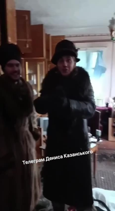 Russian Soldiers Putting On Womans Clothing While Looting the Houses of Their Own People