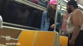 A black man targets a petite female and threatens to hurt her while another black man