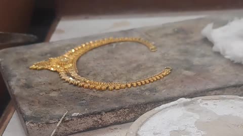 Handcrafted Gold Design”