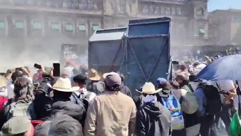 Generation Z protesters demolish the security wall around the National Palace in Mexico.