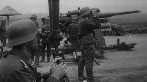 88mm Flak guns engage Soviet targets on land and at sea on the Kerch peninsula in May 1942