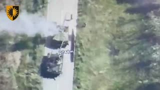 A Pair of Russian Tanks Come Under Fire