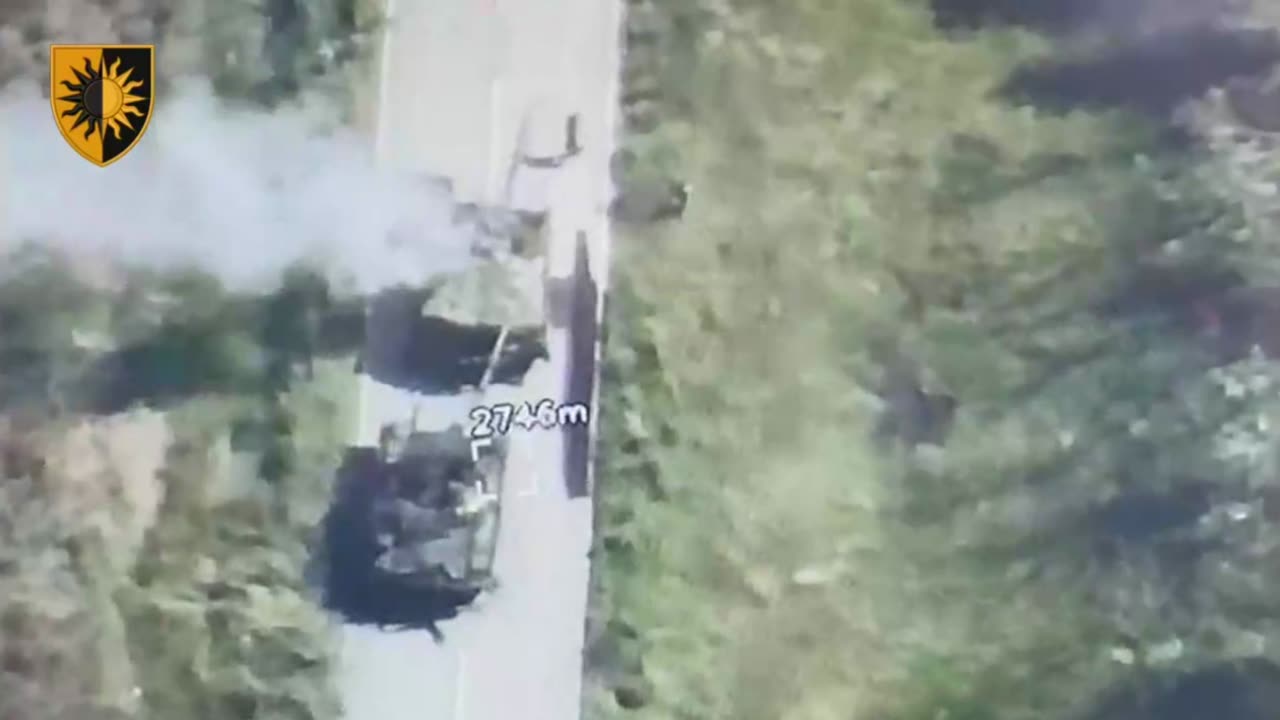 A Pair of Russian Tanks Come Under Fire