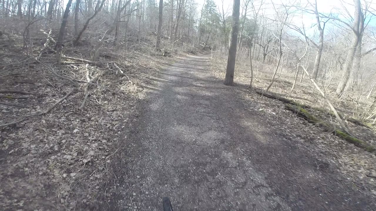 Bike ride, fast to and from trail in the woods
