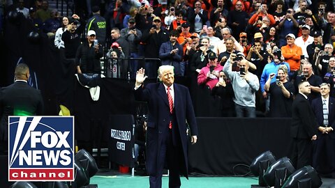 Trump greeted by chants of 'USA!' at NCAA wrestling championship