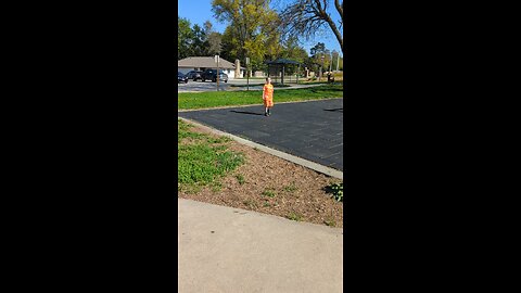 BradKuz76 Tomrik playing catch at the park.