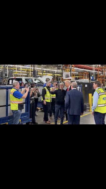 Trump takes selfies with Ford plant workers