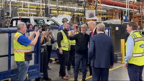 Trump takes selfies with Ford plant workers