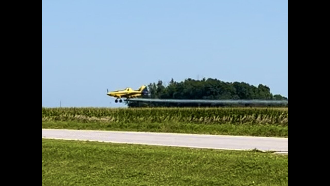 Crop Dusting over our Neighbors Corn Fields.