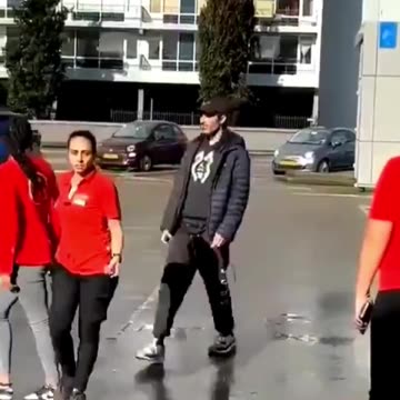 Usual suspect first spits at her, then hits her. Women in Europe are not safe.