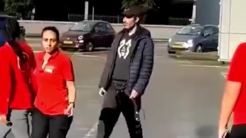 Usual suspect first spits at her, then hits her. Women in Europe are not safe.