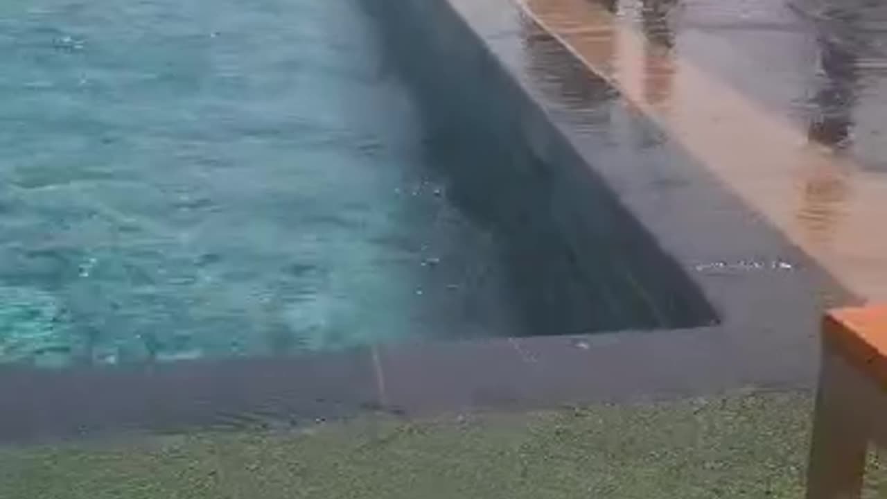 Roof top pool during earthquake