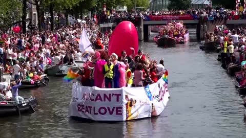 Amsterdam's iconic canals filled with LGBTQ+ Pride
