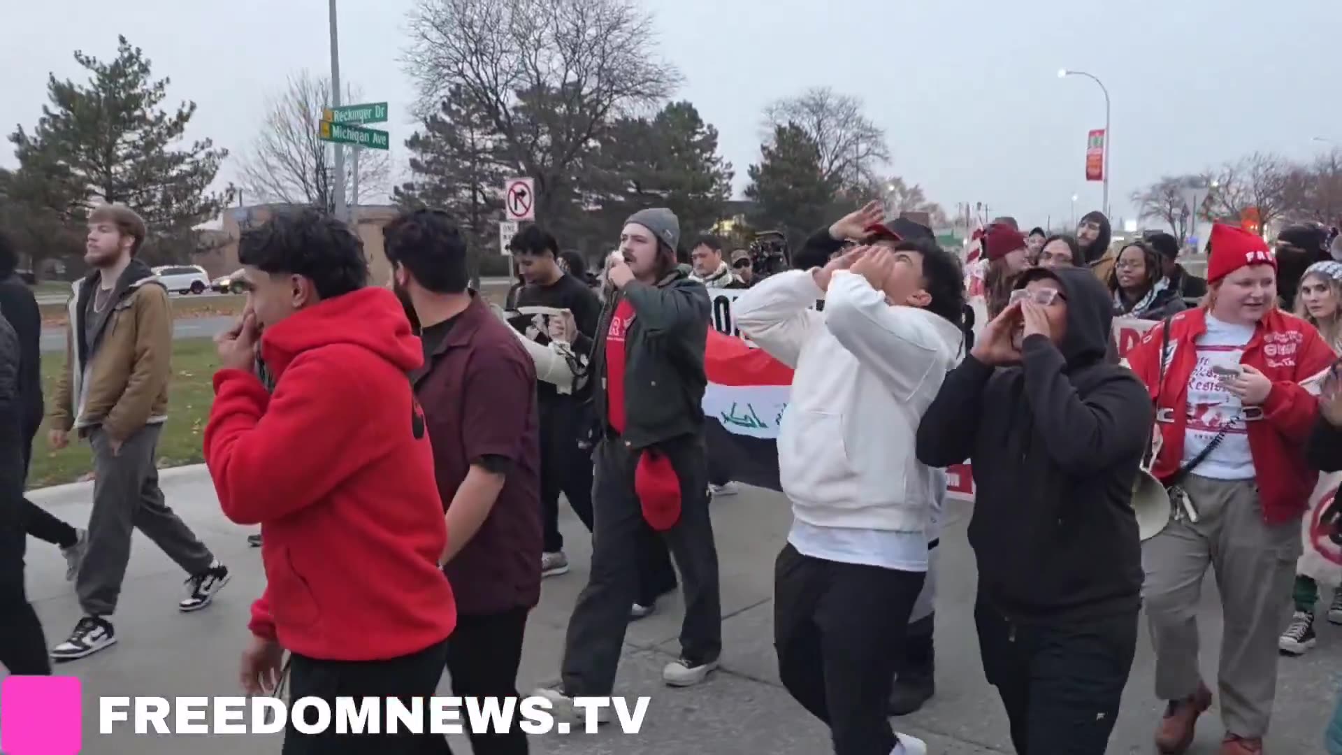 Fascists Go Home! Protesters chant as they march along Americans Against Islamification,
