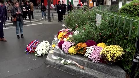 Macron visits cafes targeted in Nov. 13 attacks on tenth anniversary