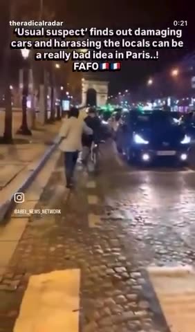 Paris France - A local culturally enriches a Black invader