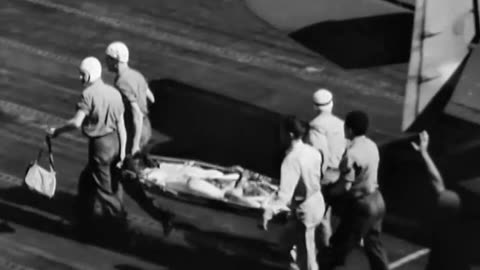 Grumman Avenger lands on USS Essex with a wounded gunner on board on November 25th 1944