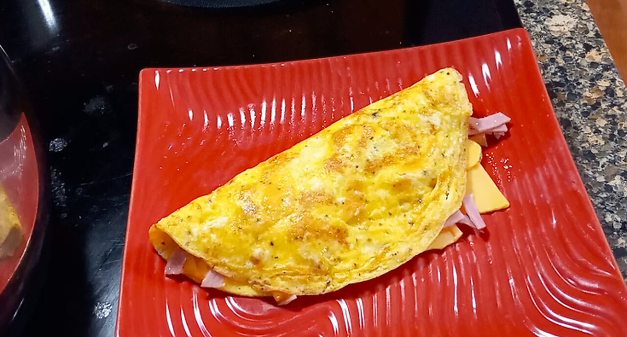 Making A Ham And Cheese Omelette