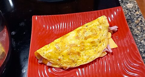 Making A Ham And Cheese Omelette