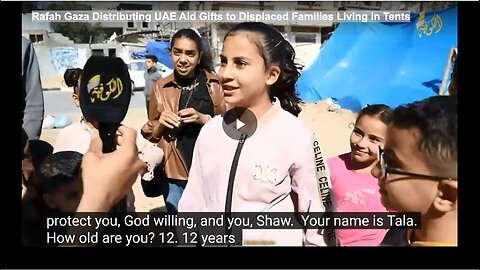 "UAE Aid Gifts Distributed to Displaced Families in Tents in Rafah Gaza"