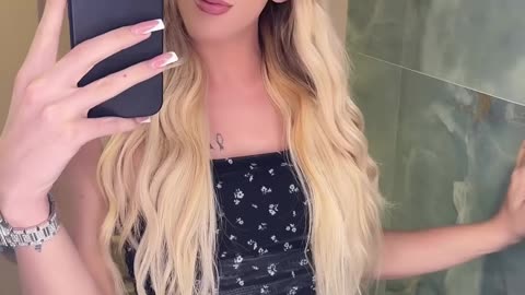 Blonde tgirl in home