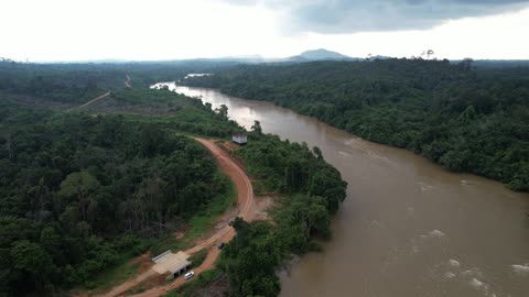 DJI Air 2S: raw earth roads, golden rivers, and the endless green of Borneo’s beating heart