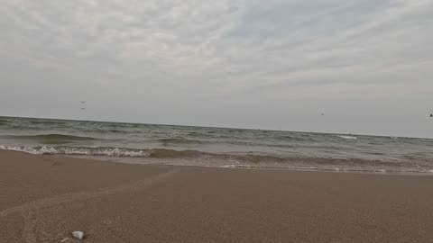 Walking on the sand to see the lake