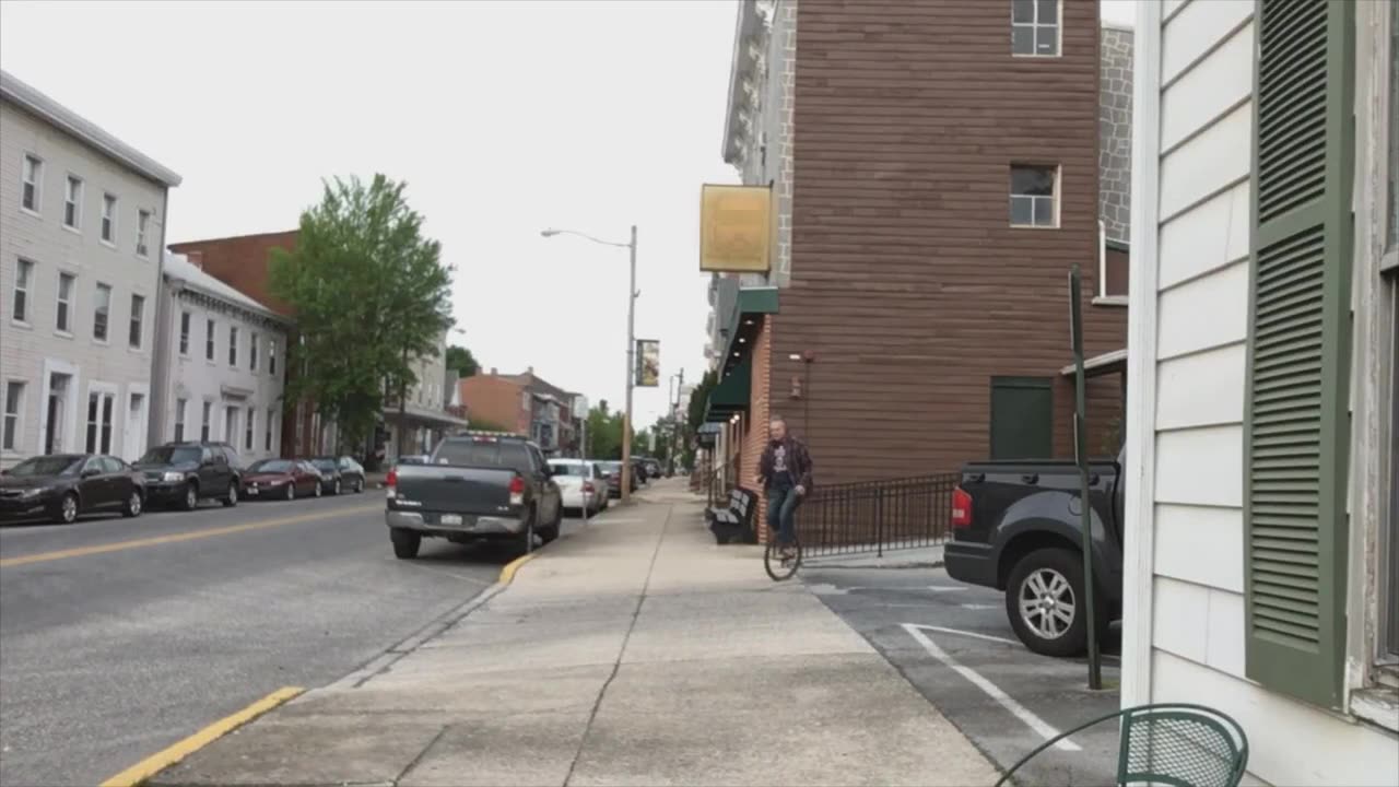 Est. 2021 upload 16 Jun 25 Bruce Brickner Rides Unicycle in Front of Brickner's Guitars, LLC\the most disgusting bathroom ever