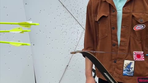 🏹 Watch the arrow fly in slow motion as focus and strength meet the bullseye!