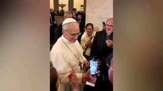 Pope Leo XIV greets well-wishers, hours after being elected