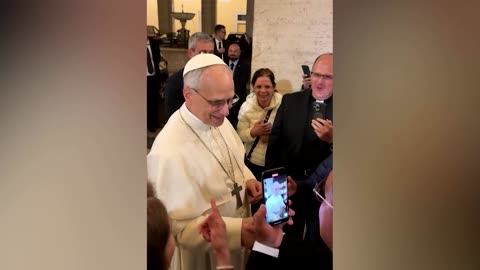Pope Leo XIV greets well-wishers, hours after being elected