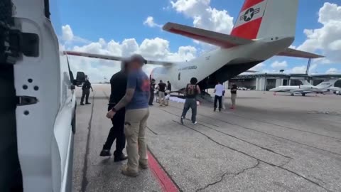 U.S. Coast Guard planes assisting in deportation flights