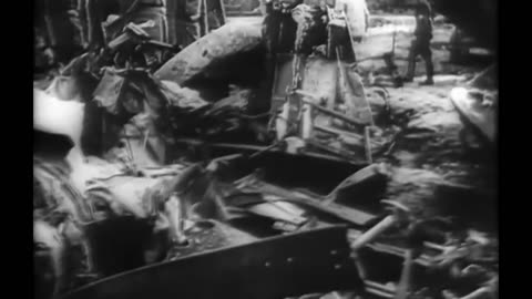 german_personnel_sift_through_the_remains