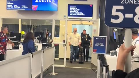 Police Escort Obnoxious Passenger Off Plane