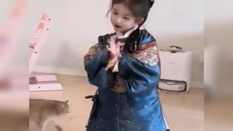 Adorable Little Girl Dancing in Traditional Asian Costume