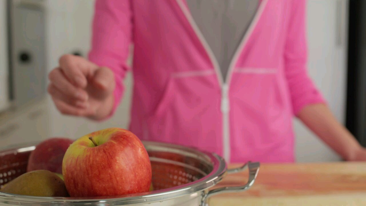 Chopping fruit for a salad